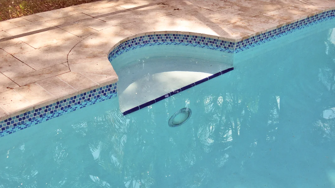 Resurfaced pool alternate view in Miami FL - Diamond Brite quartz finish