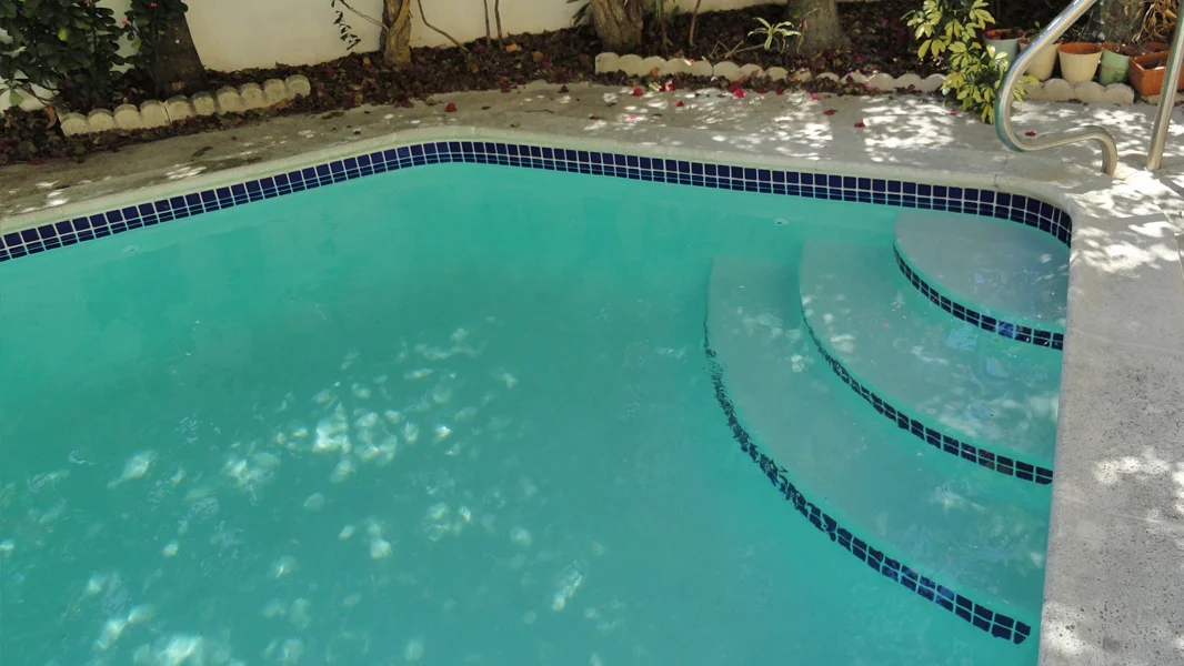 Resurfaced pool alternate view in Miami FL - Diamond Brite quartz finish